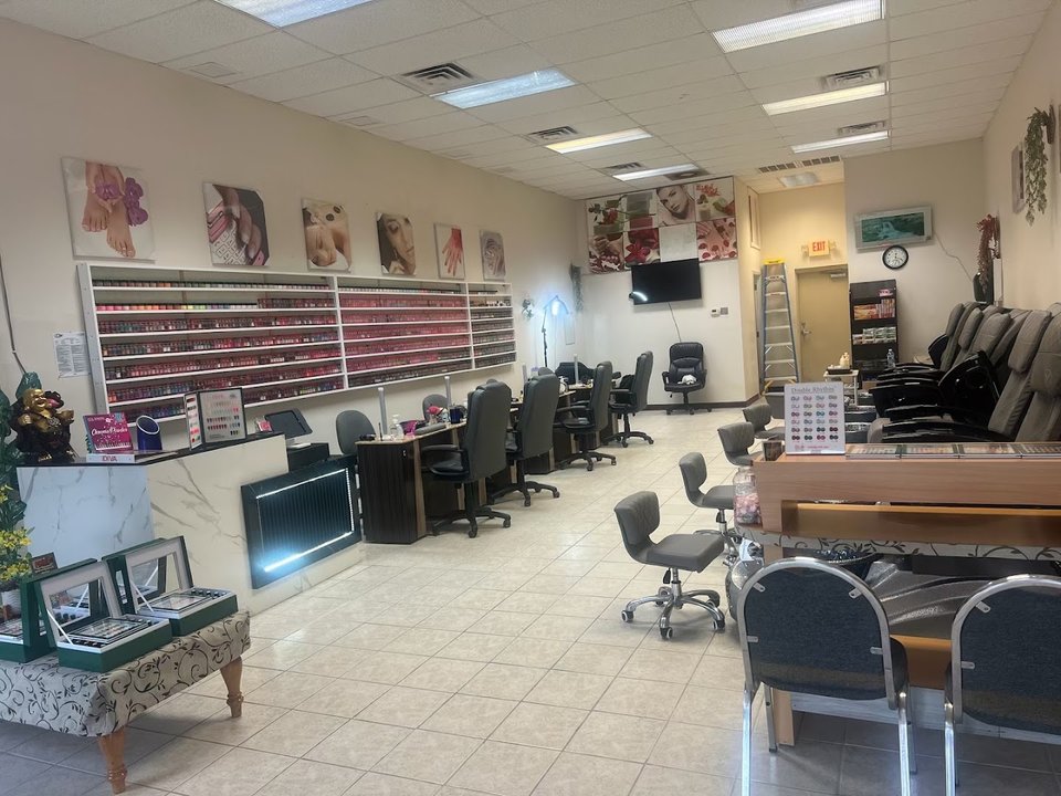 Neat manicure stations inside a clean nail salon.